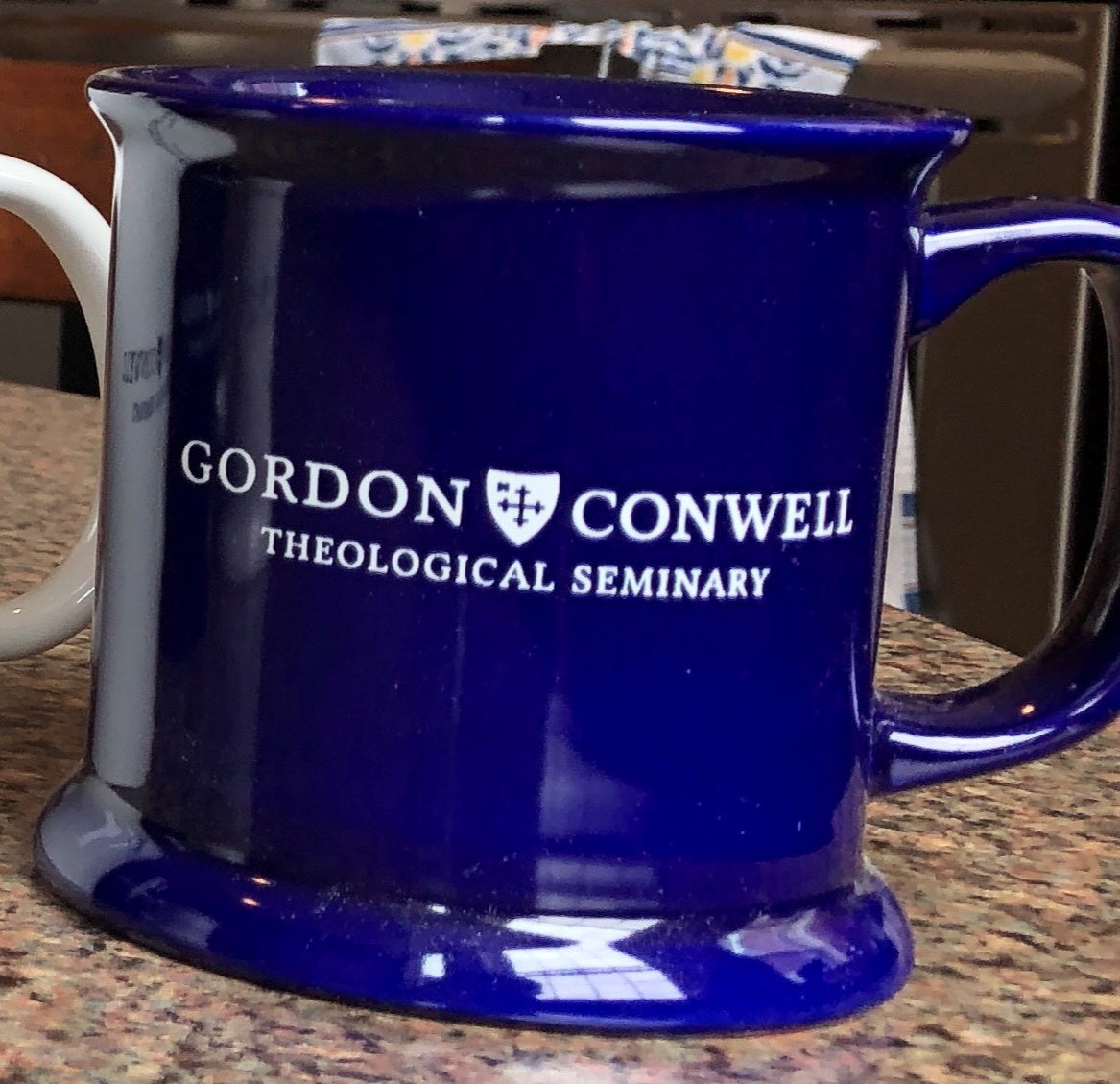 http://gordonconwell.store/cdn/shop/products/Ceramic_Mug_Navy_1200x1200.jpg?v=1697053435